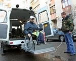 В Мариуполе в этом году может появиться социальное такси. мариуполь, инвалид, ограниченными возможностями, социальное такси, специальные автомобили, road, outdoor, car, person, vehicle, land vehicle, wheel, auto part, van. A man riding on the back of a truck