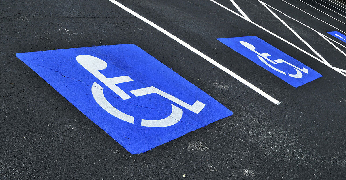 Ухвалено законопроект, який впорядковує правила паркування для людей з особливими потребами. законопроект, особливими потребами, паркування, інвалід, інвалідність, road, outdoor, sign, electric blue. A sign on the side of a road