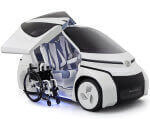 Toyota построила электрокар для людей в инвалидной коляске (ФОТО). toyota concept-i ride, автомобіль, автосалон, инвалидная коляска, электрокар, wheel, land vehicle, vehicle, auto part, tire, car. A close up of a motorcycle