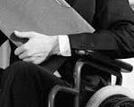 «Розумне пристосування» для людей з інвалідністю по-українськи. конвенція оон, доступ, забезпечення, розумне пристосування, інвалідність, person, black and white, indoor, clothing, man. A person sitting in a chair
