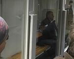 Голову центру МСЕ та лікаря-експерта заарештовано на 60 діб з правом застави у 2 млн грн для кожного. посадовець, суд, учасник ато, хабар, інвалідність, indoor, person, human face, clothing, man, mirror, door. A person sitting in front of a window