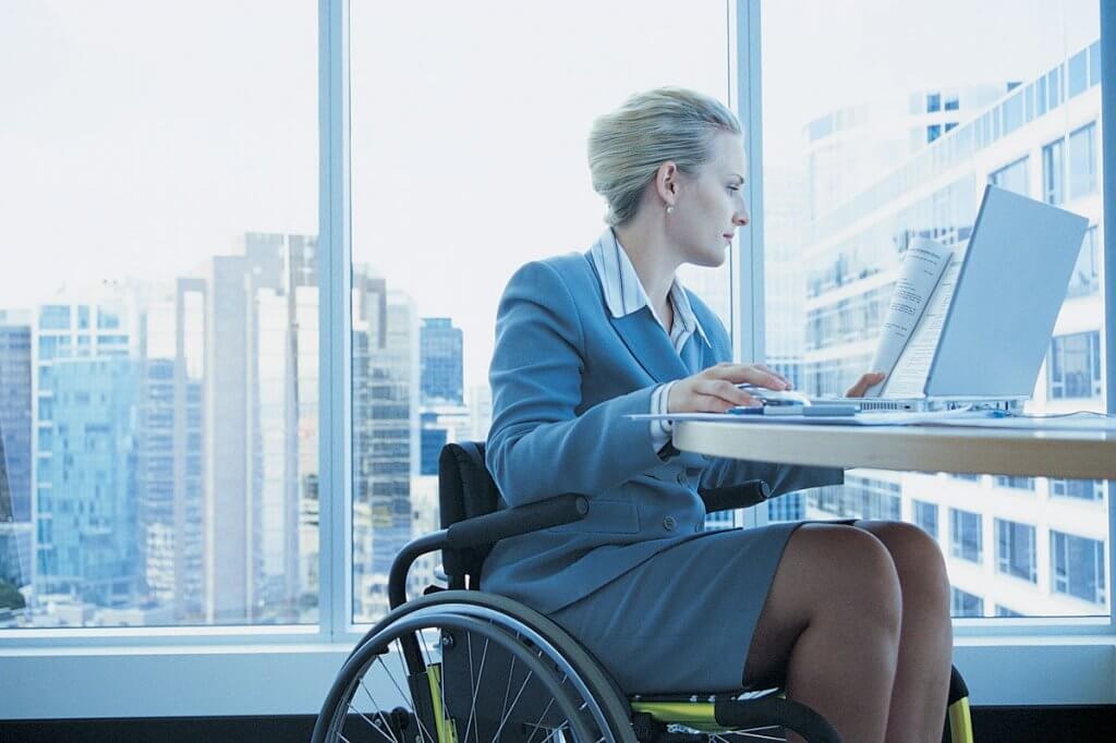 У Полтаві запрацювала «гаряча лінія» пошуку роботи для людей з інвалідністю. полтава, гаряча лінія, працевлаштування, роботодавець, інвалідність, person, sitting, man, laptop, clothing. A person sitting in a chair in front of a laptop