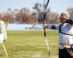 У Дніпрі відбулася перша обласна спартакіада для бійців з інвалідністю (ФОТОРЕПОРТАЖ). дніпро, атовець, змагання, спартакиада, інвалідність, sky, grass, outdoor, person, bow and arrow, playground, archery, target archery, field archery, sport. A person holding a kite