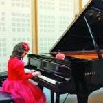 «У трирічному віці вперше почула, як звучить піаніно і як цікаво по ньому «проходити» пальцями...»